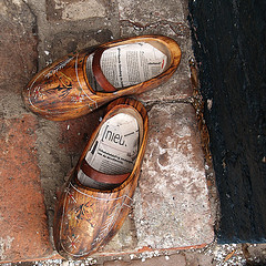 wooden shoes & newspaper inlay, by Kokjebalder, with Creative Commons licence
